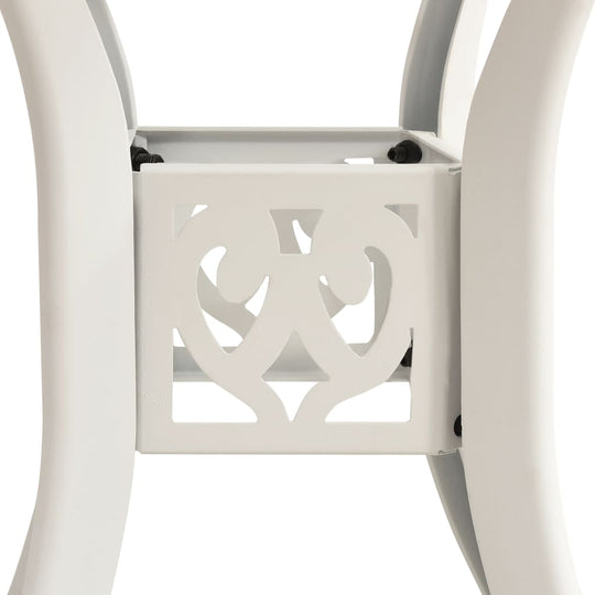 Elegant white cast aluminum bistro set leg detail showcasing intricate pattern design for outdoor decor.