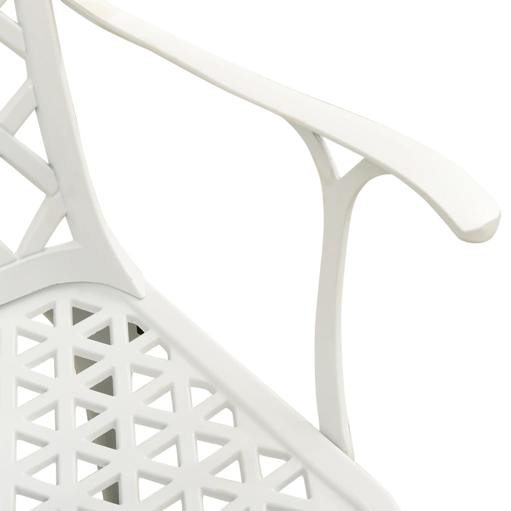 Close-up of a white cast aluminium bistro chair showcasing intricate patterns and comfortable armrest design.