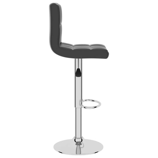 Bar stool in black faux leather with chrome base and footrest, ideal for outdoor and patio furniture settings.