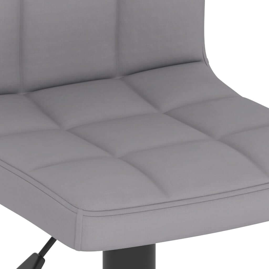 Bar Stool Light  Fabric with soft gray upholstery and tufted design for comfort.