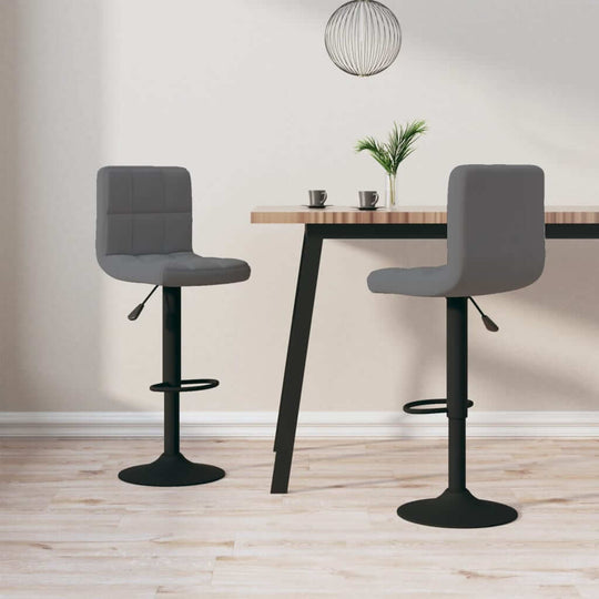 Dark grey velvet bar stools with adjustable height at modern kitchen table, perfect for outdoor and home patio furniture.