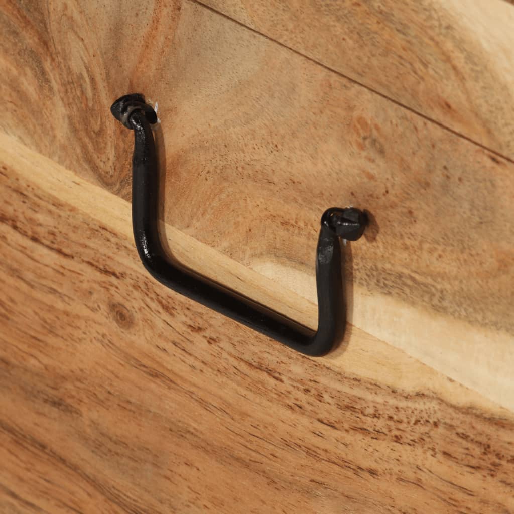 Close-up of the black handle on a solid acacia wood storage chest, showcasing its sturdy design and natural wood texture.