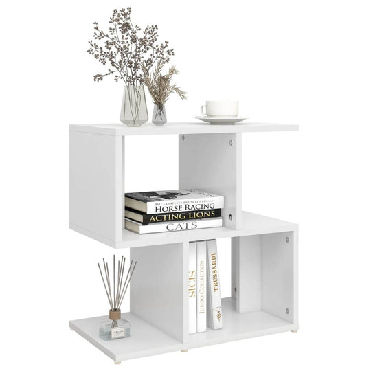 White bedside cabinet with open compartments, stylish decor elements, and ample storage for books and small items.