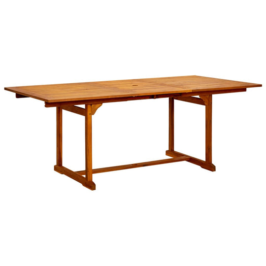 Extendable solid acacia wood dining table for outdoor garden use, featuring a durable and weather-resistant design.