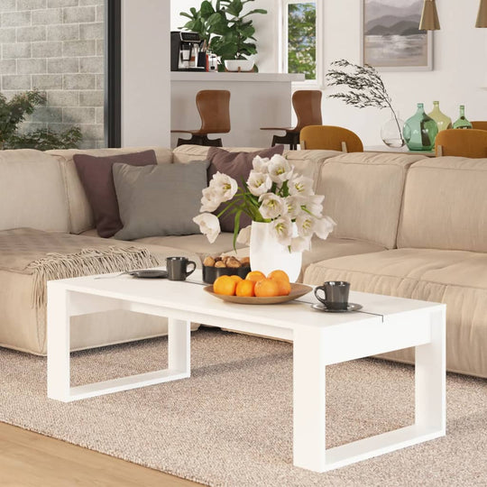 Coffee Table  110x50x35 cm Engineered Wood - Cherryfurnie LLC This coffee table is perfect for keeping your drinks close at hand or displaying books and decorations. Its sturdy tabletop securely holds drinks, food, and other necessities and can be easily cleaned with a damp cloth. Note: The table top is composed of 2 boards. Colour: White Material: Engineered wood Dimensions: 110 x 50 x 35 cm (L x W x H) Assembly required: Yes  Furniture -> Tables -> Accent Tables -> Coffee Tables #