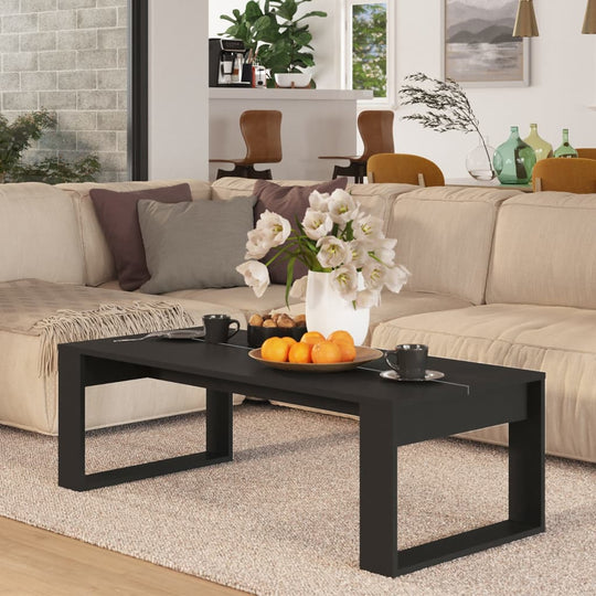 Coffee Table  110x50x35 cm Engineered Wood - Cherryfurnie LLC This coffee table offers both functionality and style as it serves as a convenient spot for storing drinks and displaying decorative items. Its 2-board tabletop ensures stability and can easily be cleaned with a damp cloth. Colour: Black Material: Engineered wood Dimensions: 110 x 50 x 35 cm (L x W x H) Assembly required: Yes  Furniture -> Tables -> Accent Tables -> Coffee Tables #