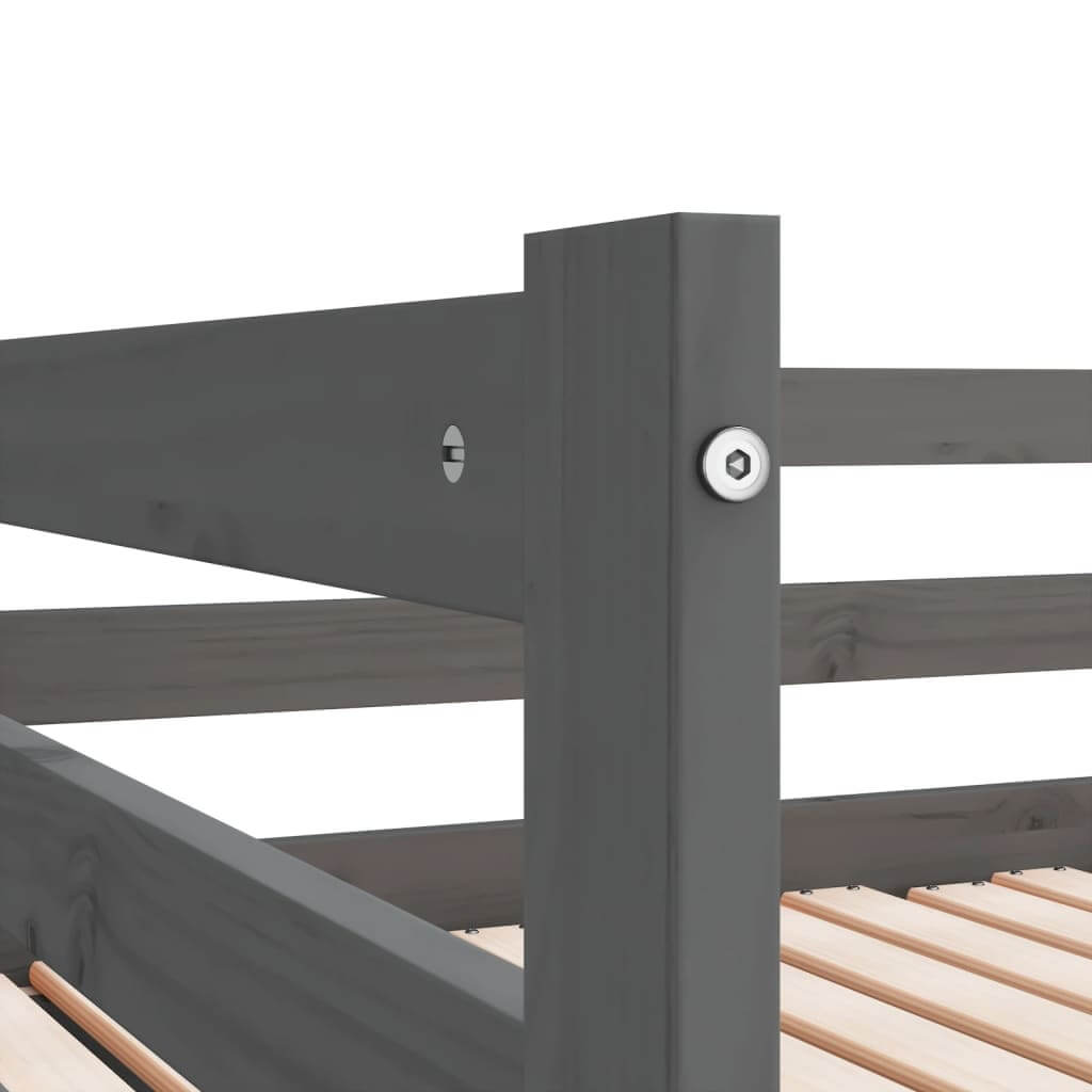 Close-up of the grey wooden frame of a pull-out day bed, highlighting sturdy construction and detail.