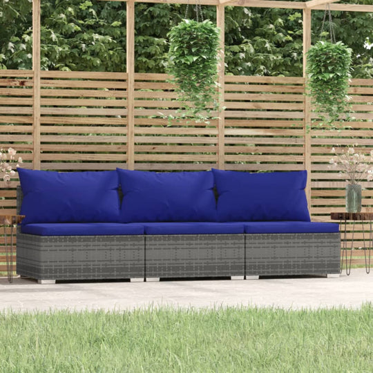 Stylish 3-seater poly rattan sofa with blue cushions, perfect for outdoor patio or garden lounge setting.