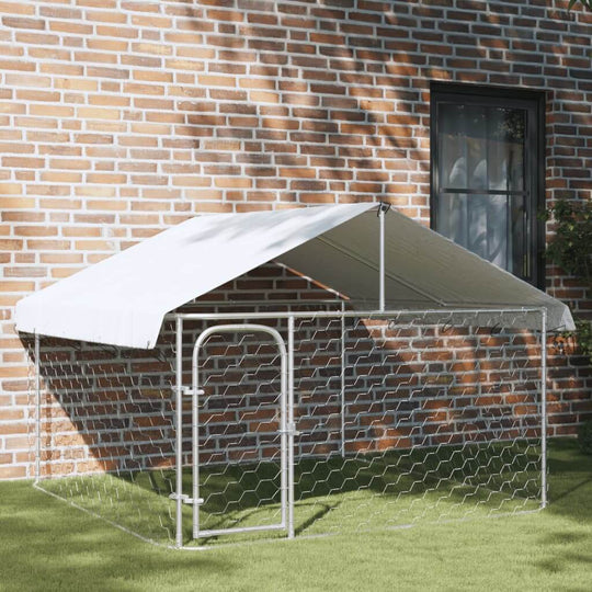 Outdoor dog kennel with roof, providing a safe and spacious area for pets in the yard.