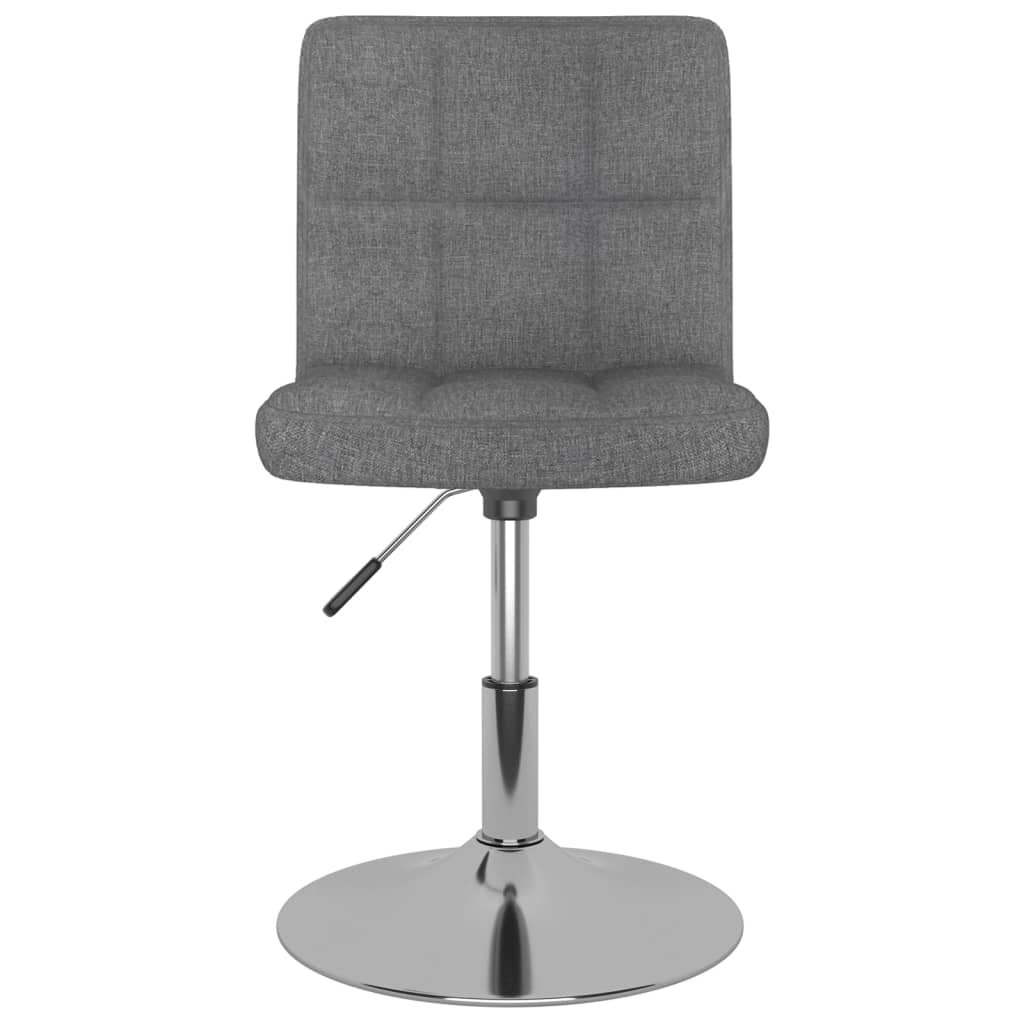 Swivel dining chair in light grey fabric with chromed steel frame and gas lift mechanism for adjustable height.