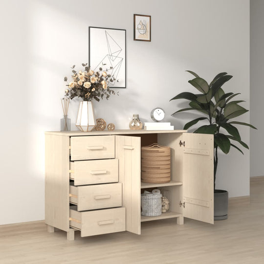 Wooden sideboard with drawers and doors, showcased in a modern decor setting with plants and decorative accents.