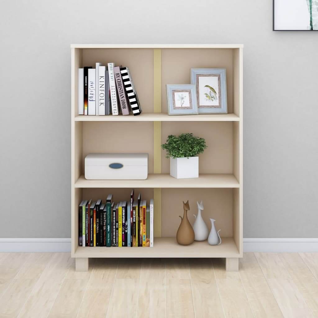 Wooden book cabinet with three shelves, displaying books, decorative items, and a potted plant in a modern interior setting.