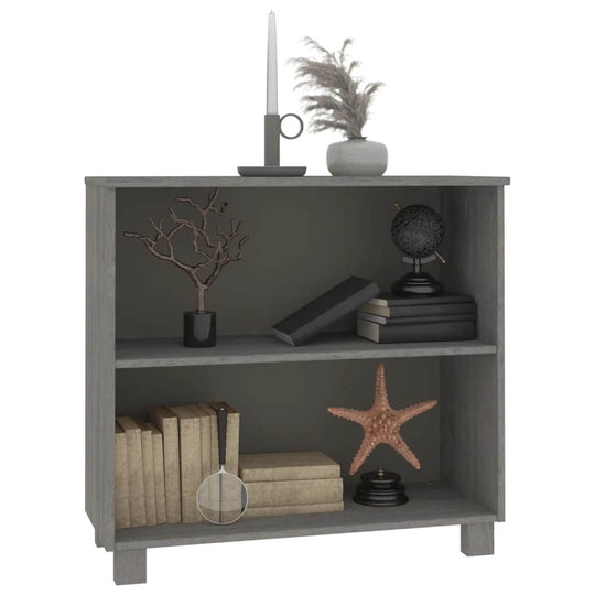 Light grey wooden sideboard with decor, featuring two shelves, books, candles, and decorative items. Ideal for stylish interiors.