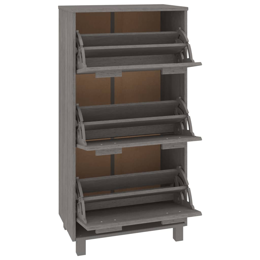 Light grey wooden shoe cabinet with three flip-drawers, made of solid pine, ideal for organizing shoes and reducing clutter.