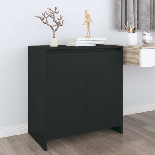 Black sideboard made of engineered wood with two doors, ideal for storage and displaying decor in modern interiors.