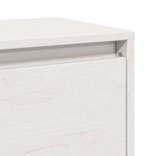 Close-up of white solid pinewood wall cabinet, showcasing the sleek design and sturdy construction for versatile storage.