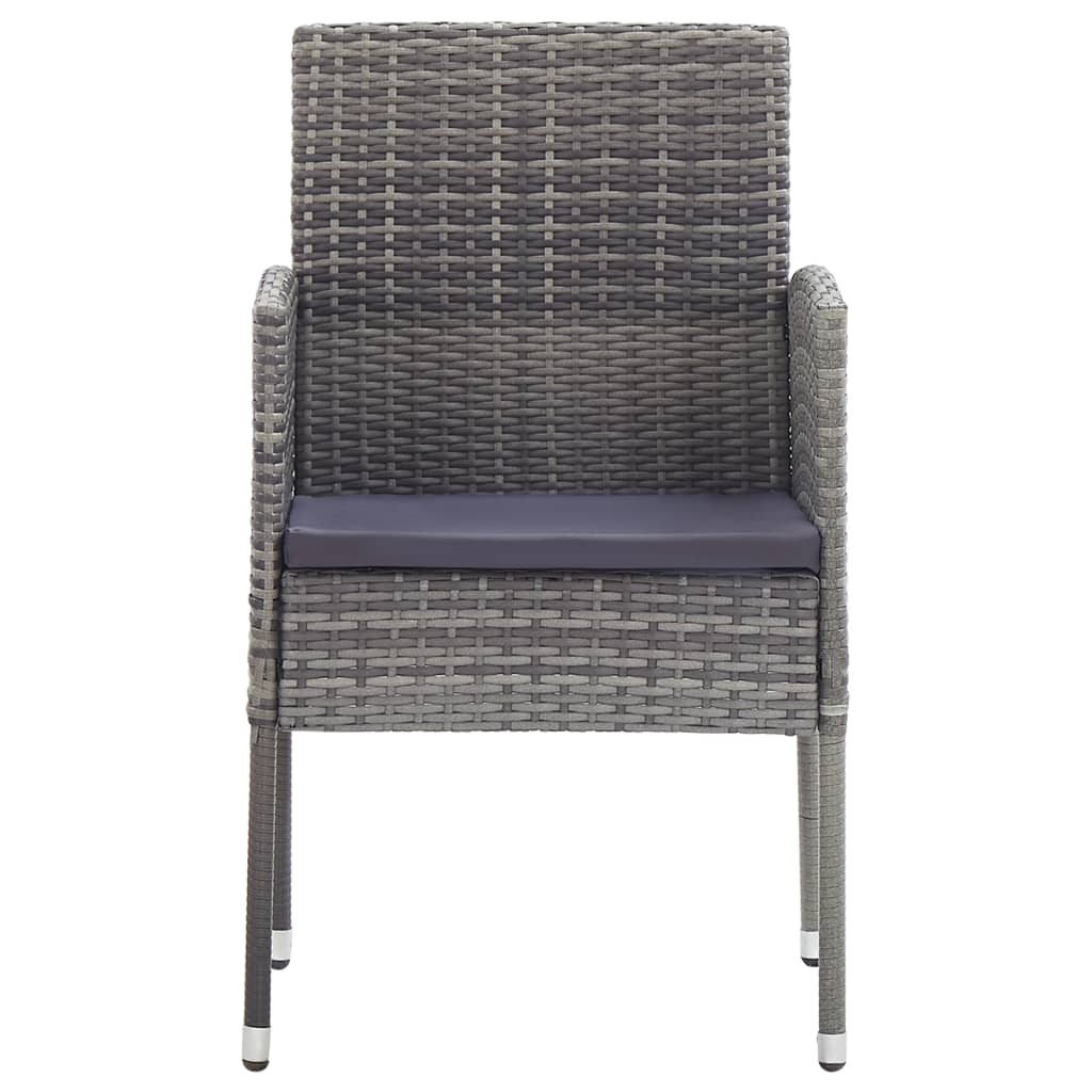 Dark grey cushion on a poly rattan garden chair, perfect for outdoor furniture and family lounging.