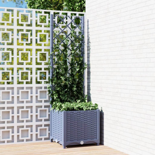 Blue grey garden planter with trellis, featuring lush green plants, perfect for outdoor decoration on balconies or terraces.