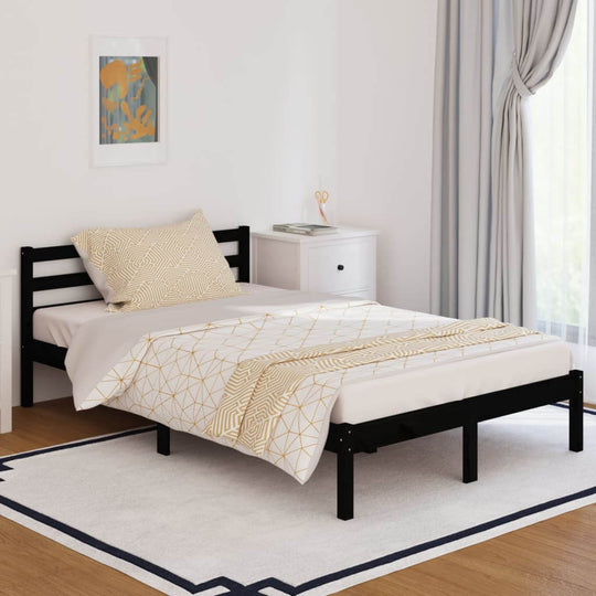 Black solid wood pine bed frame with decorative bedding in a modern room setting, perfect for guests and daily use.