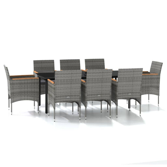 9 Piece Garden Dining Set with Cushions and Black featuring a rectangular table and eight chairs, perfect for outdoor dining.