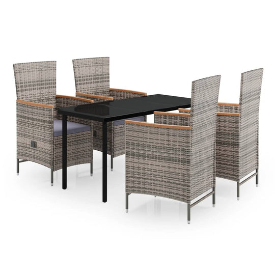 5 Piece Garden Dining Set with Cushions featuring stylish rattan chairs and a sleek black table.
