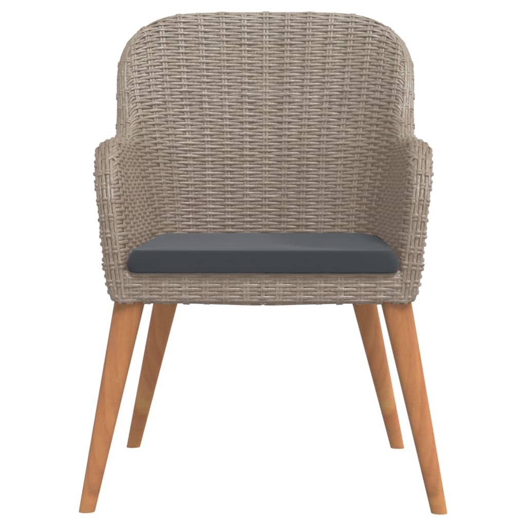 7 Piece Garden Dining Set with Cushions chair featuring a woven design and sturdy wooden legs.