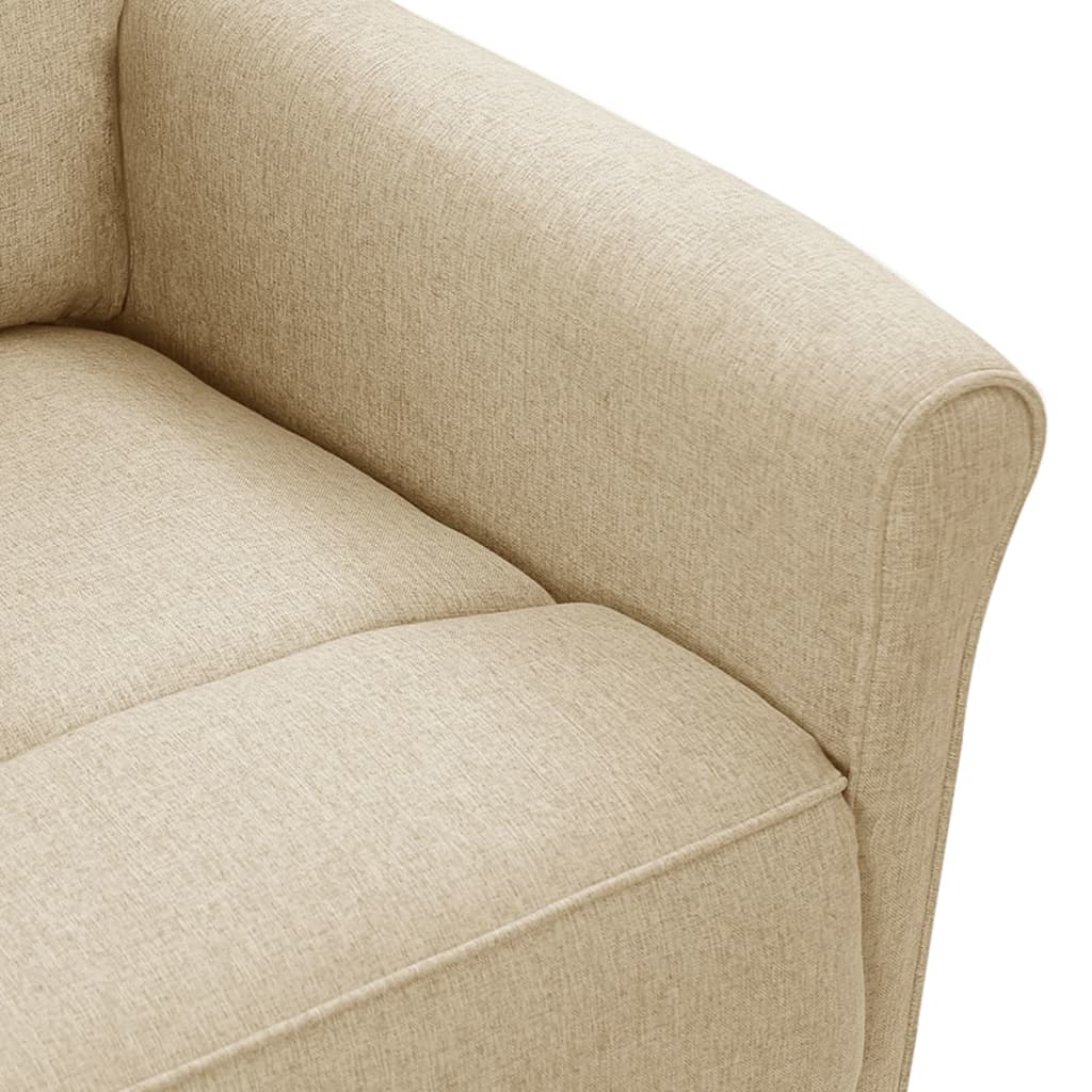 Close-up of cream fabric on a cozy recliner chair armrest, showcasing its soft texture and comfortable padding.