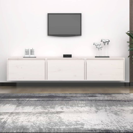 White solid pine TV cabinet with three doors and decorative items, ideal for modern lounge furniture.