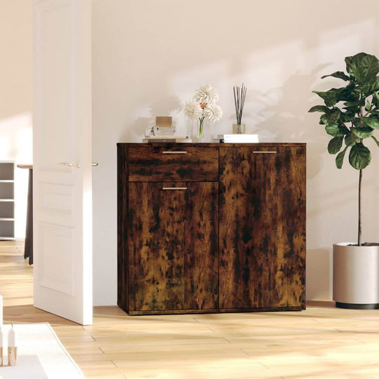 Sideboard in smoked oak wood finish, featuring two doors and a drawer, enhancing minimalist room decor and easy maintenance.