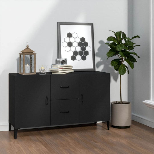 Black engineered wood sideboard with storage, decorative plant, and framed art in a stylish living space.