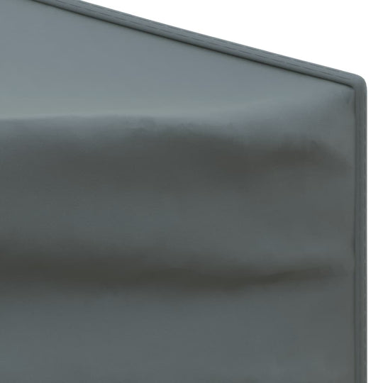 Close-up of the anthracite fabric corner of a folding party tent with smooth finish.