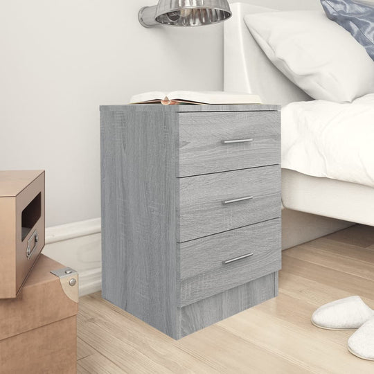 Grey Sonoma bedside cabinet with three drawers, perfect for efficient storage and stylish bedroom decor.