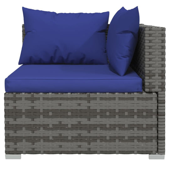 Stylish corner section of a poly rattan garden sofa set with blue cushions for outdoor seating.