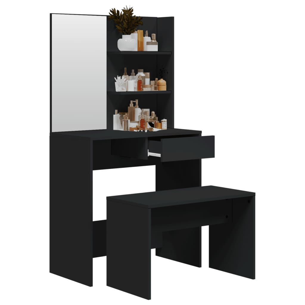 Black dressing table set with mirror and storage for cosmetics, ideal for stylish bedroom decor.