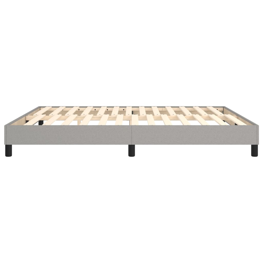 Light grey bed frame without mattress, 180x200 cm, featuring sturdy plywood slats and supportive legs for stability.