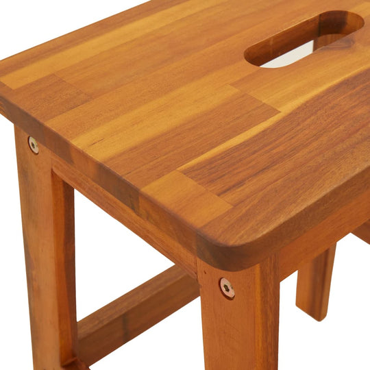 2 step stool made of solid acacia wood, showcasing its rustic charm and practical design for home and outdoor spaces.