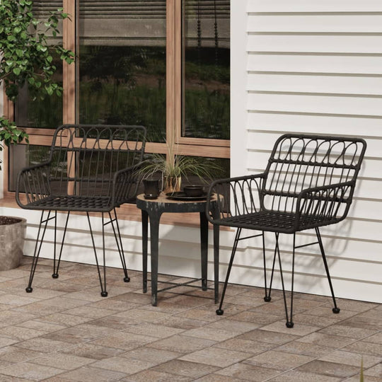 Stylish black garden chairs with armrests, perfect for outdoor relaxation on patio or balcony.