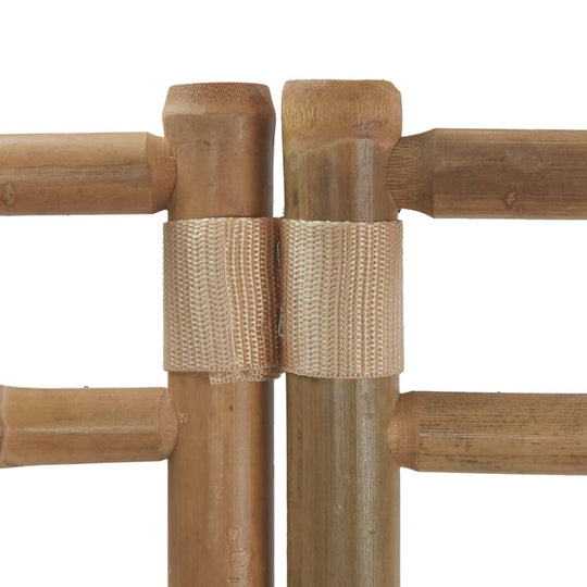 Close-up of the connection between bamboo panels in a folding room divider, showcasing durable craftsmanship and design.