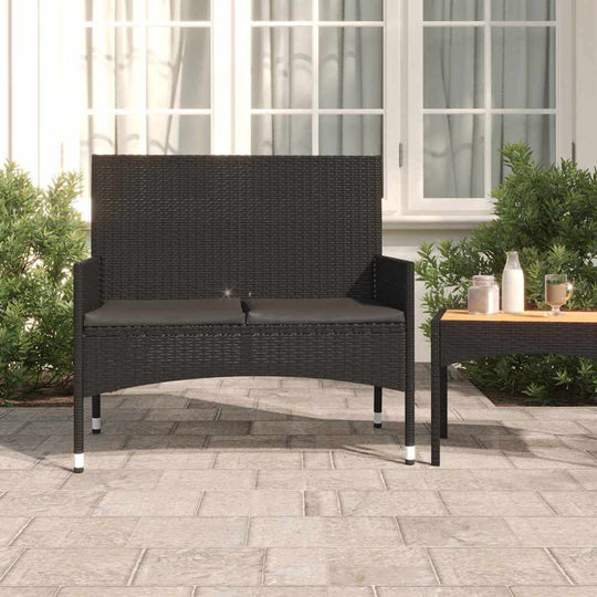 2-seater garden bench with cushions in black poly rattan, perfect for outdoor lounge and terrace furniture.