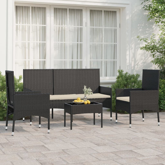 Poly rattan 4 piece garden lounge set with cushions on patio, featuring durable outdoor furniture for comfortable outdoor living space.