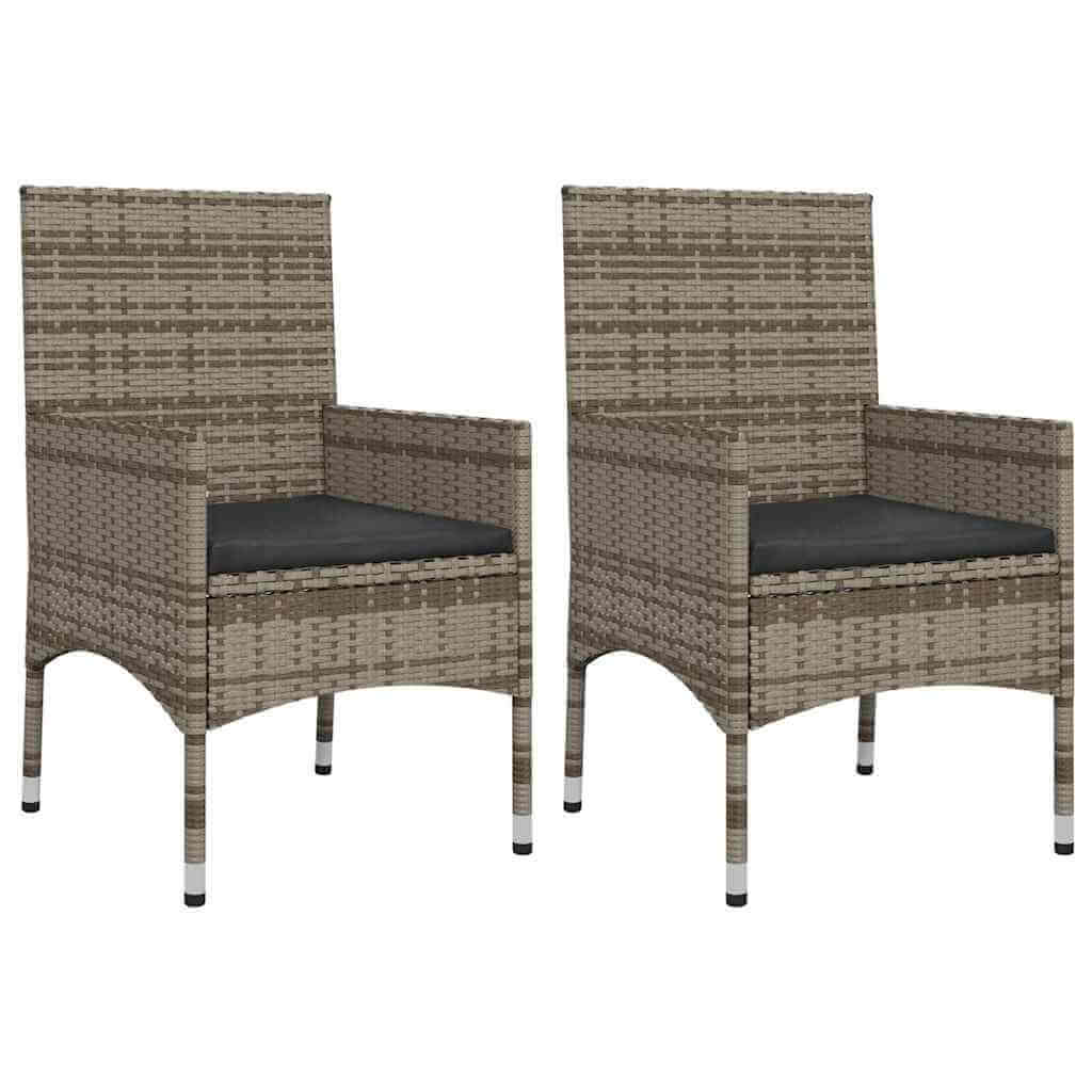 Pair of grey poly rattan garden lounge chairs with removable cushions, ideal for outdoor furniture and comfortable lounging.