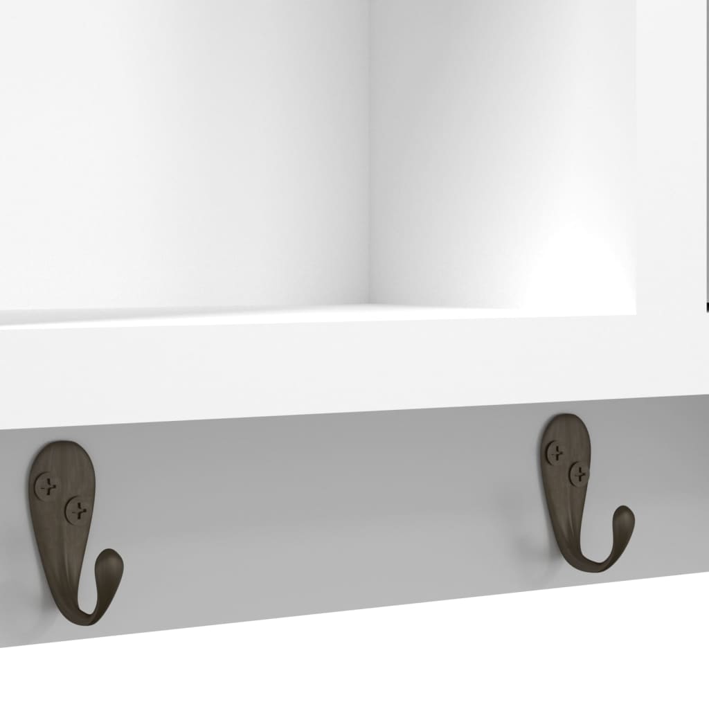 Key cabinet hooks in elegant white finish, perfect for organizing keys and accessories in modern furniture.