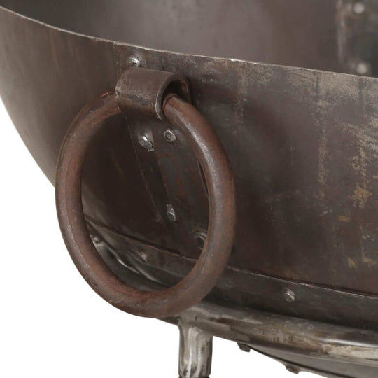 Close-up of the iron fire pit 55x55x38 cm iron with a sturdy ring handle for easy lifting.