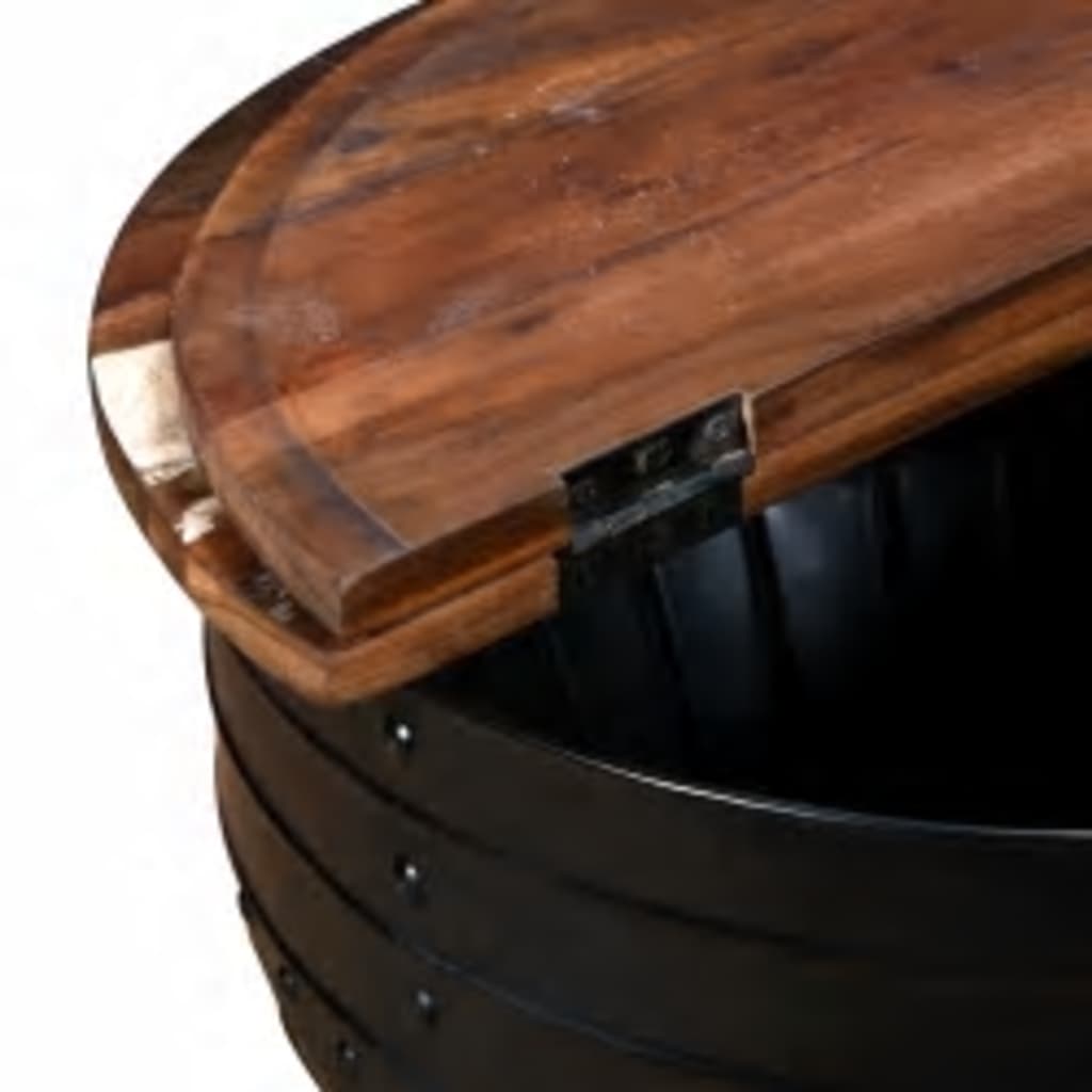 Wooden lid of a round black metal container, combining rustic design and functionality for storage or décor.