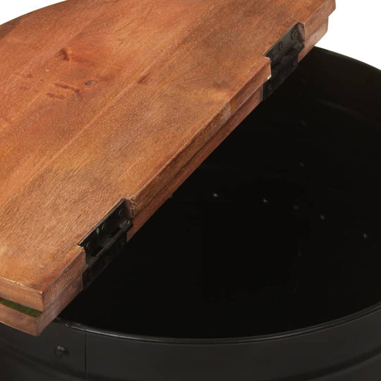 Wooden coffee table lid partially open, showcasing solid reclaimed wood and black base, perfect for furniture accents in any lounge.