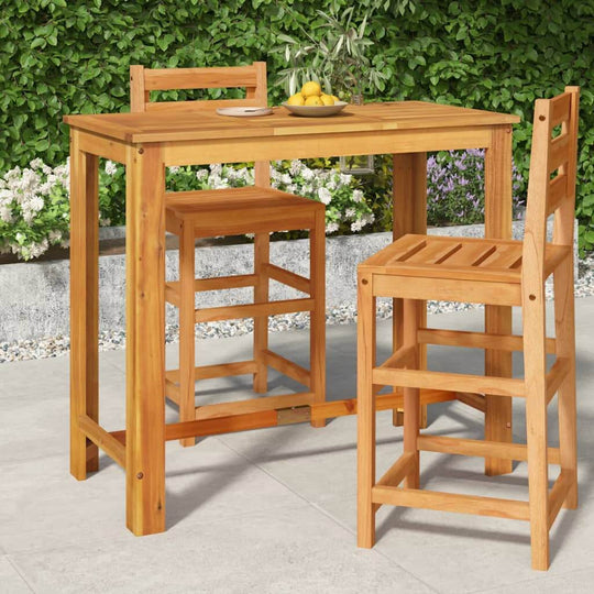 Solid wood acacia garden bar table with matching stools, ideal for outdoor dining and entertaining in a green garden setting.