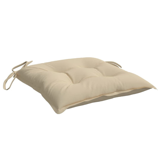 Soft beige chair cushion with ties, perfect for outdoor furniture, providing comfort and style for lounge and patio settings.