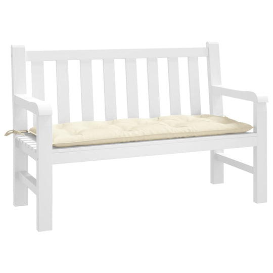 Cream garden bench cushion on a white wooden outdoor bench, enhancing comfort and style for outdoor furniture.