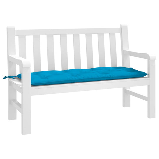 Light blue garden bench cushion on a white outdoor furniture bench, enhancing comfort and style for lounge spaces.