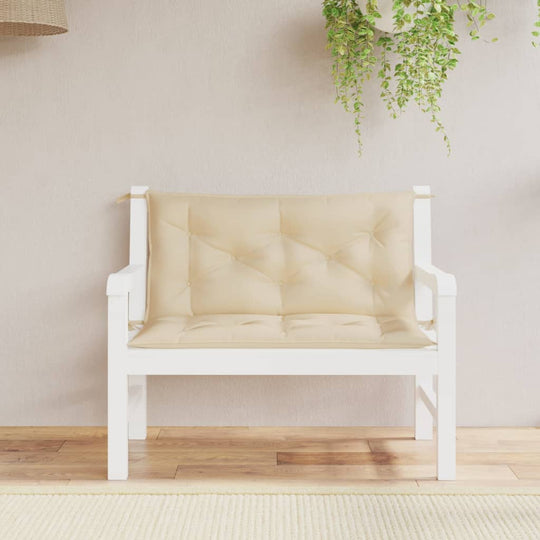 Comfortable beige garden bench cushion on white wooden bench, perfect for outdoor living spaces and lounge furniture.